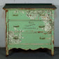 Green chest of drawers decorated with iron Orchid designs May's Roses Transfer