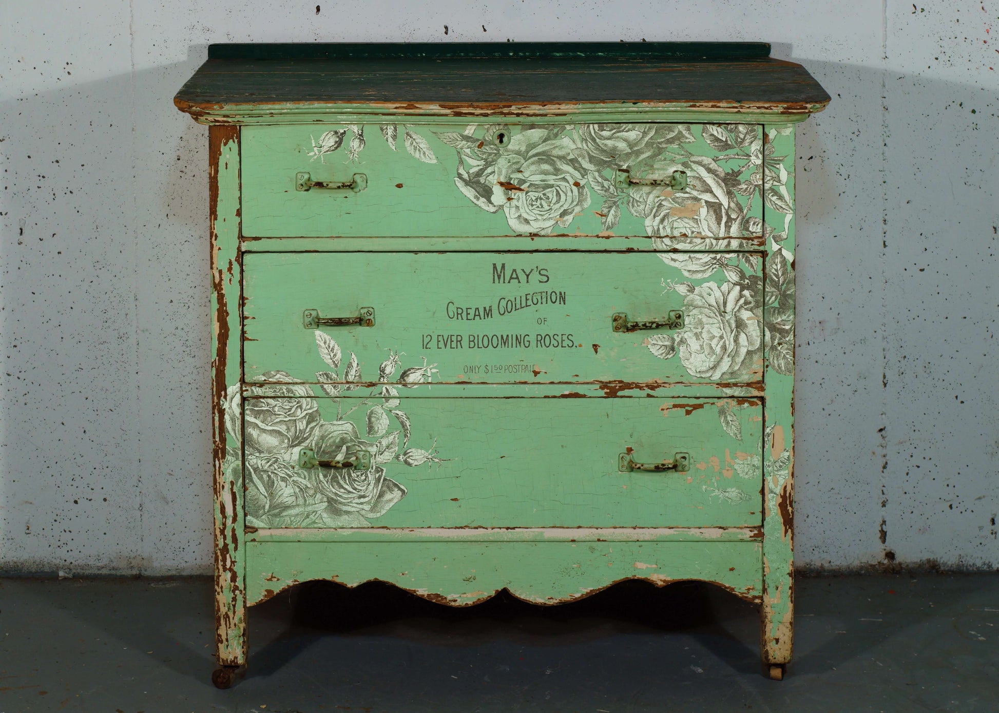 Green chest of drawers decorated with iron Orchid designs May's Roses Transfer