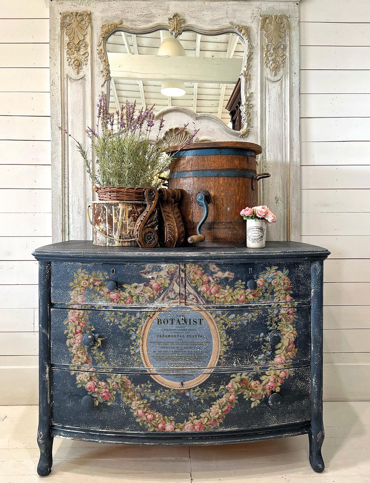 Dark blue painted elegant chest of drawers decorated with Iron Orchid Designs The Botanist Transfer 