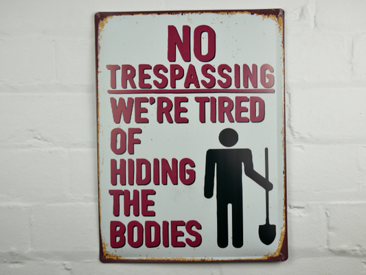 No Trespassing We're Tired Tin Sign