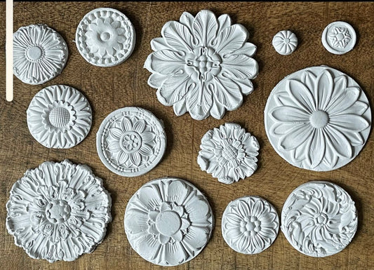 Iron Orchid Designs Rosettes Mould circular castings made out of clay