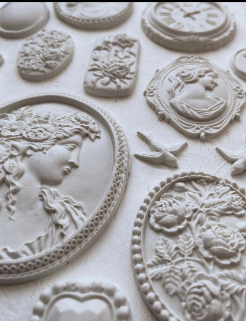 Iron Orchid Designs Cameos Mould white castings in close up.