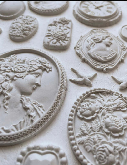 Iron Orchid Designs Cameos Mould white castings in close up.