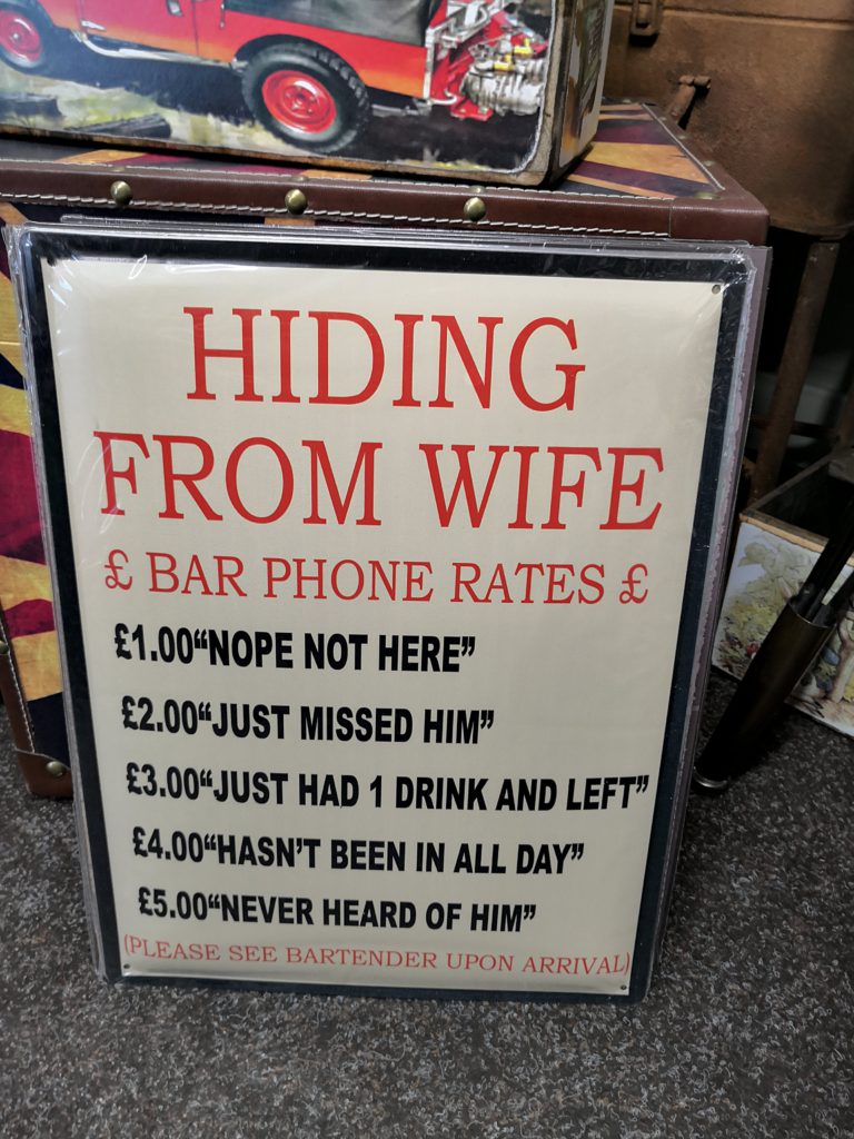 Hiding From Wife Sign